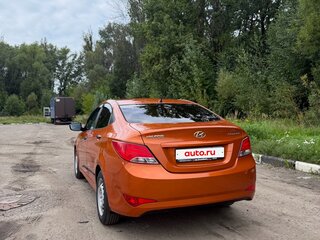 2015 Hyundai Solaris I Рестайлинг, оранжевый, 850000 рублей, вид 4