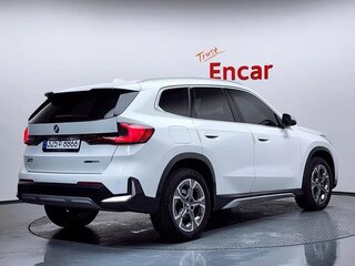 2024 BMW X1 20i xDrive III (U11/U12), белый, 5288861 рублей, вид 4