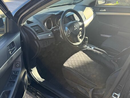 2008 Mitsubishi Lancer X, чёрный, вид 5