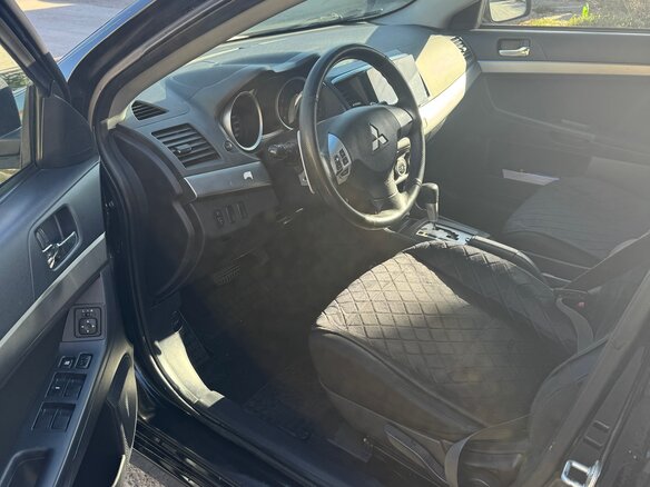 2008 Mitsubishi Lancer X, чёрный - вид 4