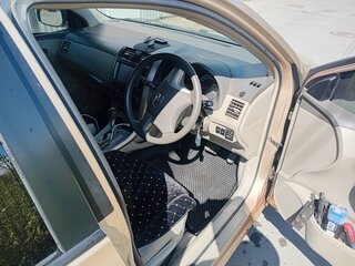 2008 Toyota Corolla Axio X (E140, E150), золотистый, 650000 рублей, вид 5