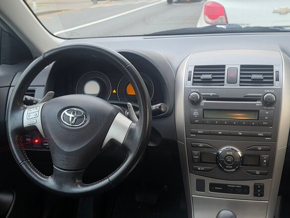 2008 Toyota Corolla AMT X (E140, E150), серебристый - вид 6