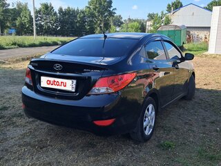 2013 Hyundai Solaris I, чёрный, 900000 рублей, вид 2