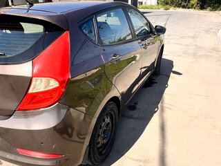 2014 Hyundai Solaris I Рестайлинг, коричневый, 700000 рублей, вид 4