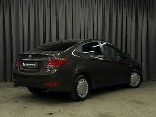 2016 Hyundai Solaris I Рестайлинг, коричневый, 599900 рублей, вид 4