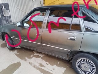 1997 Daewoo Nexia I, серый, 130000 рублей, вид 1