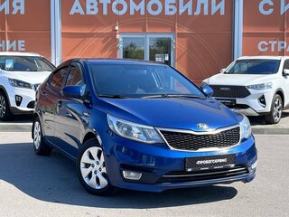 2015 Kia Rio 6-speed III, синий, 845000 рублей, вид 3
