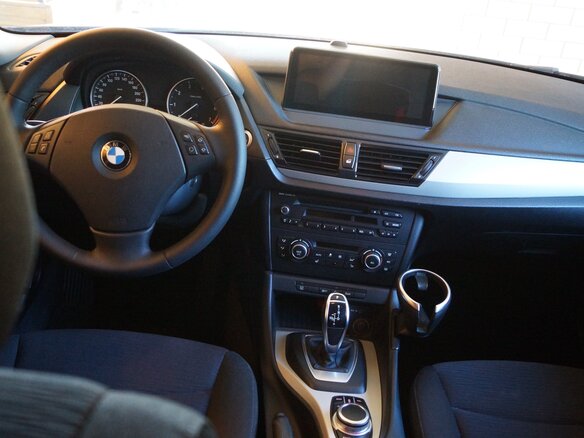 2013 BMW X1 20i I (E84) Рестайлинг, коричневый, 1330000 рублей - вид 5