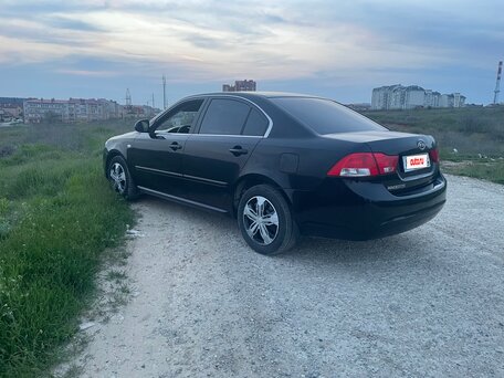 2010 Kia Magentis 5-speed II Рестайлинг, чёрный, 720000 рублей, вид 2