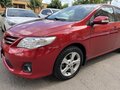 2011 Toyota Corolla X (E140, E150) Рестайлинг, пурпурный, 1300000 рублей