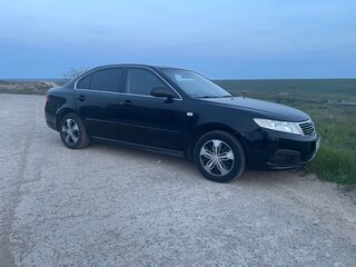 2010 Kia Magentis 5-speed II Рестайлинг, чёрный, 720000 рублей, вид 5