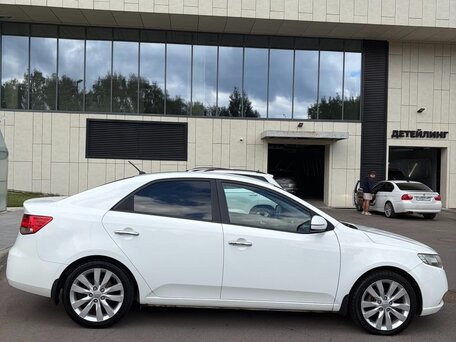 2011 Kia Cerato 6-speed II, белый, 800000 рублей, вид 3