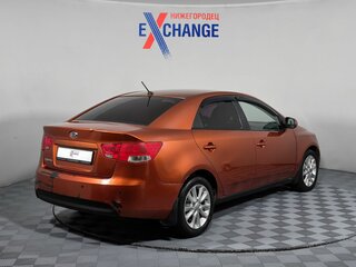 2011 Kia Cerato 6-speed II, оранжевый, 599000 рублей, вид 3