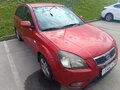 2009 Kia Rio II Рестайлинг, красный, 400000 рублей - вид 4