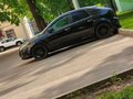2010 Ford Focus II Рестайлинг, чёрный, 550000 рублей - вид 1