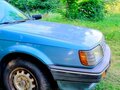 1987 Mazda 323 III (BF), синий - вид 10