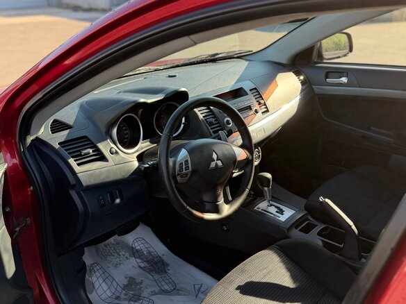 2008 Mitsubishi Lancer X, красный, 697000 рублей - вид 10