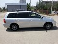 2003 Toyota Corolla Fielder IX (E120, E130), серебристый - вид 2