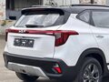 2023 Kia Seltos I Рестайлинг, белый, 1980000 рублей - вид 2