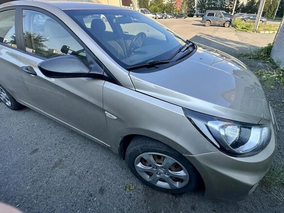 2011 Hyundai Solaris I, бежевый, 590000 рублей - вид 4