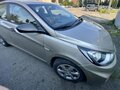 2011 Hyundai Solaris I, бежевый, 590000 рублей - вид 4