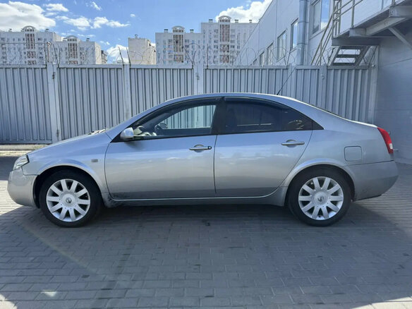 2005 Nissan Primera III (P12), серебристый - вид 1