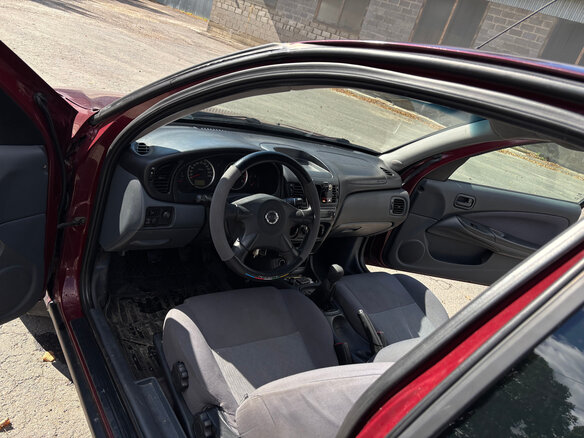 2004 Nissan Almera II (N16) Рестайлинг, красный, 360000 рублей - вид 17
