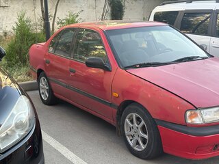 1992 Nissan Primera I (P10), красный, 120000 рублей, вид 3