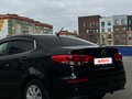 2016 Kia Rio III Рестайлинг, чёрный, 1050000 рублей - вид 5