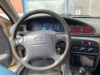 1997 Kia Sephia I Рестайлинг, бежевый, 160000 рублей, вид 2