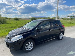 2012 Nissan Tiida I Рестайлинг, чёрный, 600000 рублей, вид 1