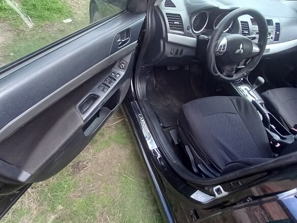 2007 Mitsubishi Lancer X, чёрный, 650000 рублей - вид 4