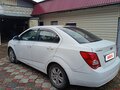 2012 Chevrolet Aveo II, белый, 515000 рублей - вид 2