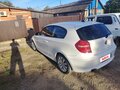 2010 BMW 1 серии 116i I (E81/E82/E87/E88) Рестайлинг, белый - вид 1