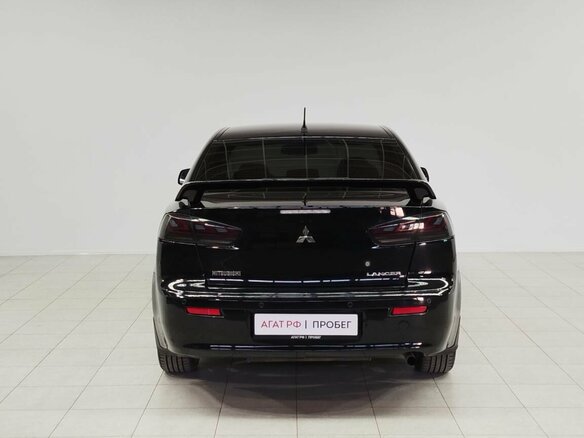 2010 Mitsubishi Lancer X, чёрный, 750000 рублей - вид 5