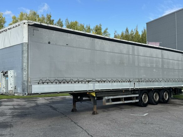 2015 Schmitz Cargobull 9084, серебристый - вид 2