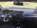 2012 Kia Rio 4-speed III, бежевый, 730000 рублей - вид 7