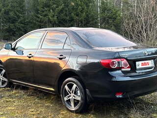2011 Toyota Corolla X (E140, E150) Рестайлинг, чёрный, 750000 рублей, вид 4