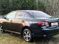 2011 Toyota Corolla X (E140, E150) Рестайлинг, чёрный, 750000 рублей - вид 3