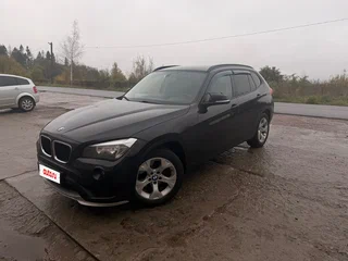 2014 BMW X1 18i I (E84) Рестайлинг, чёрный, 980000 рублей, вид 1