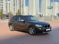 2013 BMW X1 18i I (E84) Рестайлинг, коричневый, 1350000 рублей - вид 2