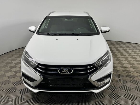 2026 Lada (ВАЗ) Vesta SW I Рестайлинг (NG), белый, 1810000 рублей - вид 1