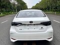 2023 Toyota Corolla XII (E210) Рестайлинг, белый - вид 2