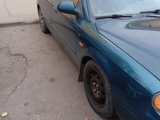 2003 Kia Shuma II, зелёный, 199000 рублей, вид 4
