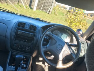 1999 Mazda Familia VIII (BJ), белый, 250000 рублей, вид 2
