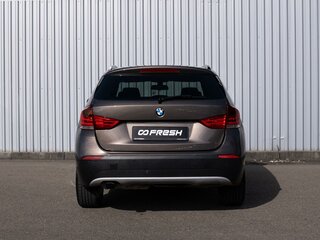 2011 BMW X1 18i I (E84), коричневый, 1399000 рублей, вид 4