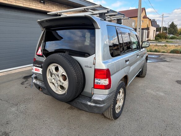 1999 Mitsubishi Pajero iO, серый - вид 6
