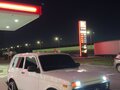 2011 Lada (ВАЗ) 2121 (4x4) I Рестайлинг, белый, 600000 рублей - вид 1
