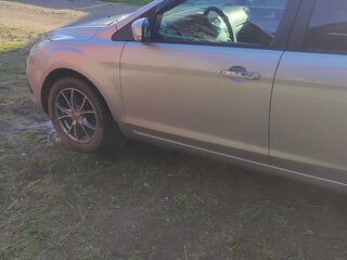 2011 Ford Focus II Рестайлинг, серебристый, 575000 рублей, вид 2