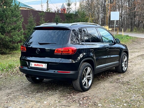 2011 Volkswagen Tiguan I Рестайлинг, чёрный, 1550000 рублей - вид 2